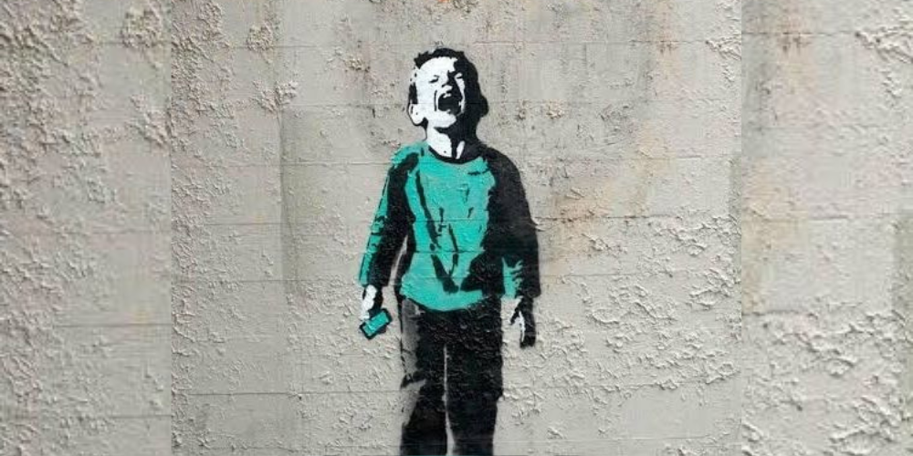 Who is Banksy Unmasking the Anonymous Street Artist